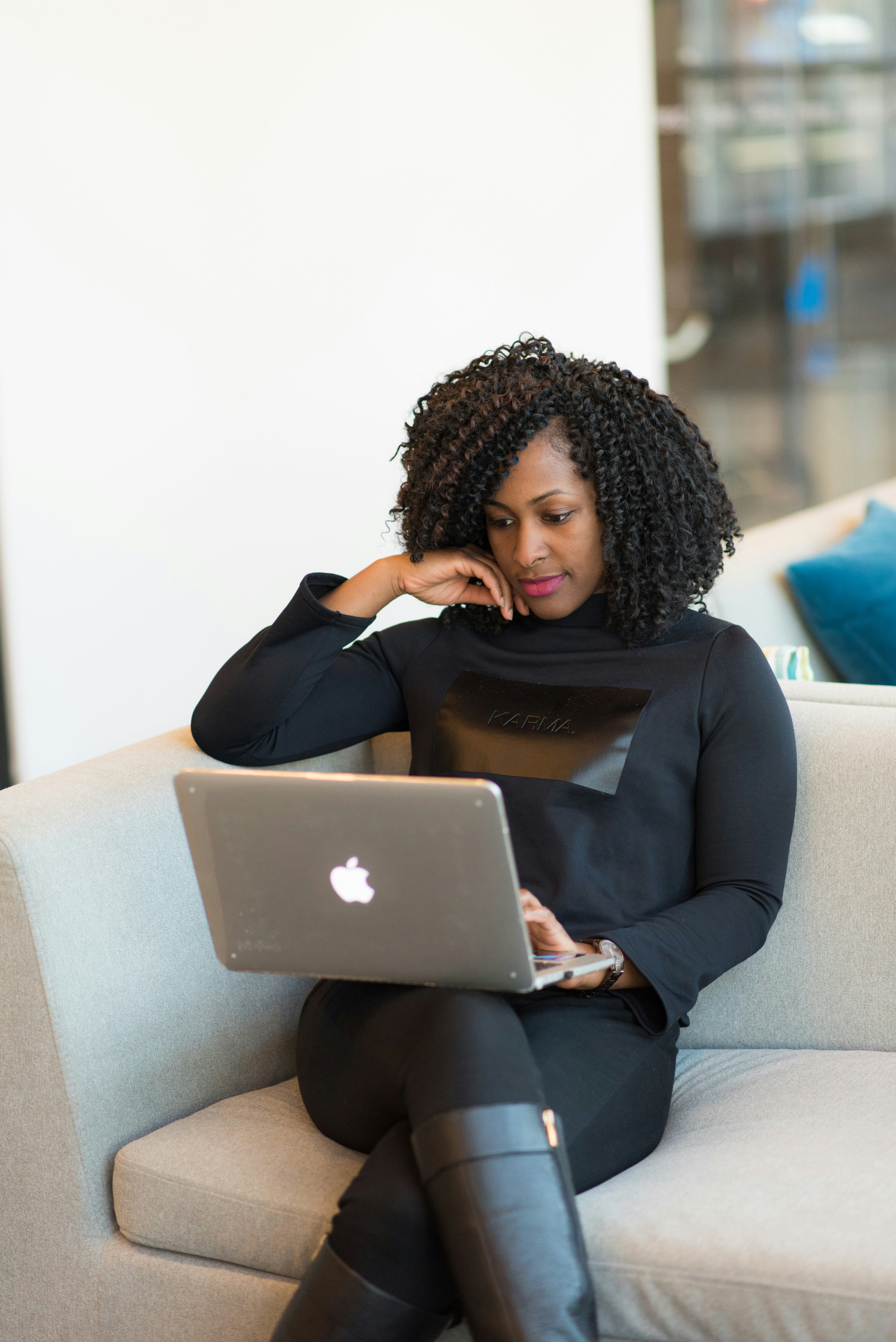 A busy professional at their desk, focused on their work